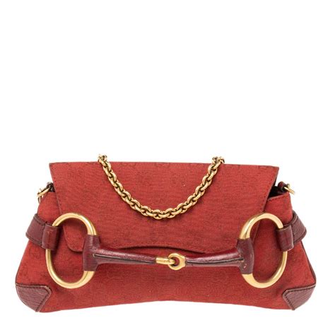 horsebit clutch gucci|Gucci Horsebit chain clutch.